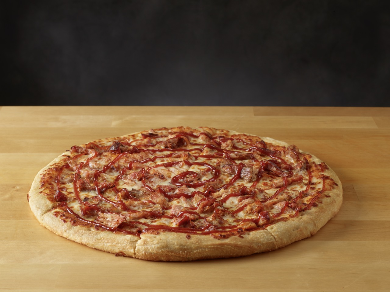 Picture of Pulled Pork Whole Pizza with BBQ on top