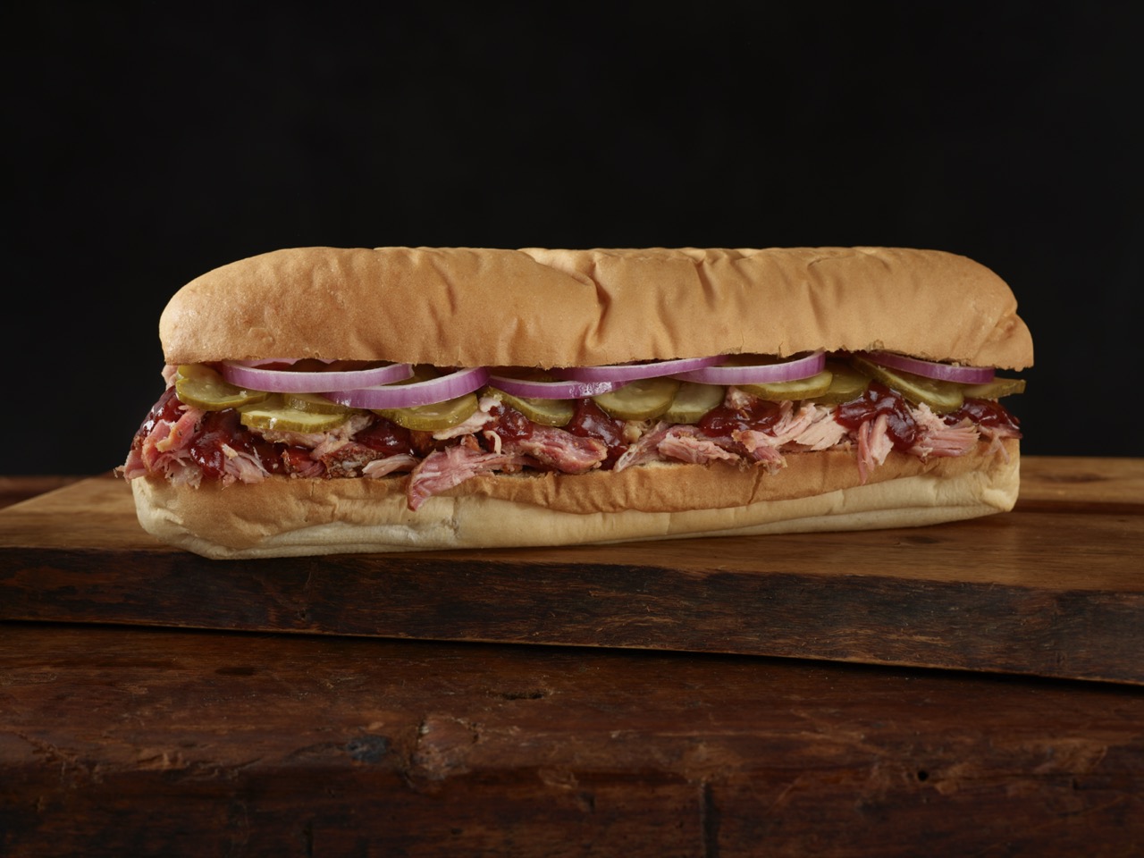 Pulled Pork Sub with veggies in between with meat